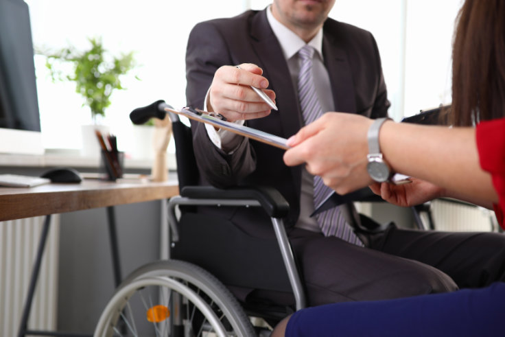 Mitarbeiter im Rollstuhl